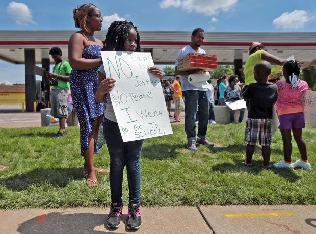 With classes canceled, student joins protest in Ferguson
